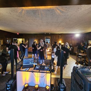 1021 Events DJ booth overlooking an active wedding reception